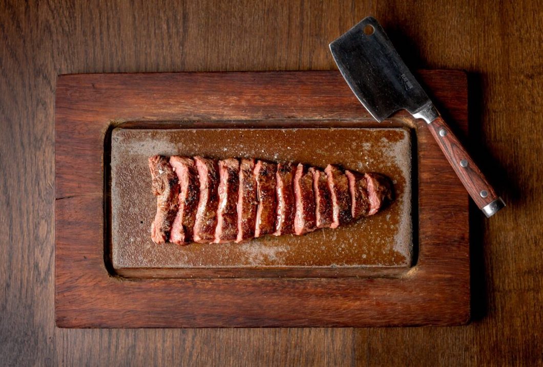 The Ultimate Guide to Perfectly Grilled Cast Iron New York Steak: Unveiling the Secrets of Irresistible Flavor